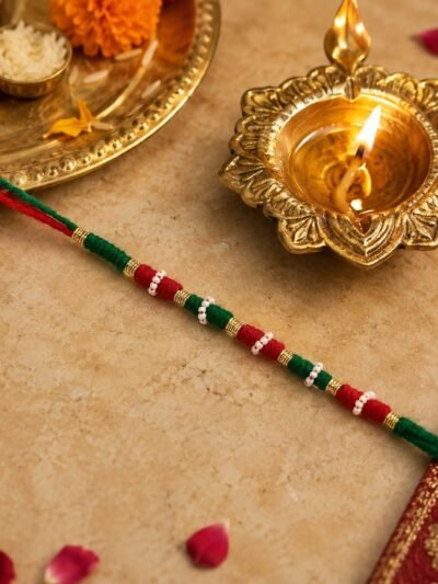 Designer Rakhi � Handmade with Golden Beads & Ethnic Threads