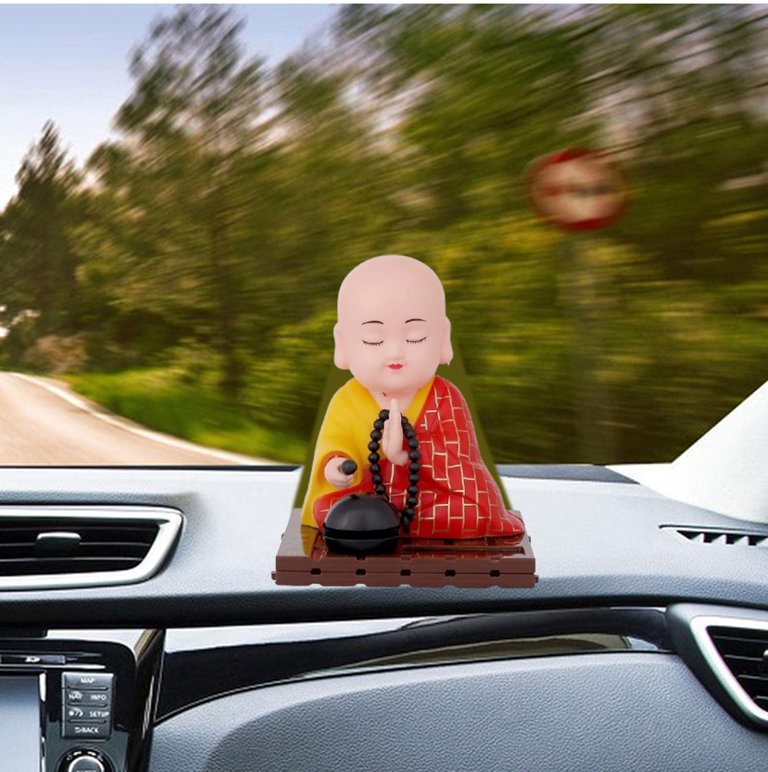 Solar Buddha Statue � Moving Head & Hand Decor | XcelCraft