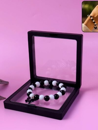 Black & White Beaded Bracelet with Cross Pendant – Elegant Style